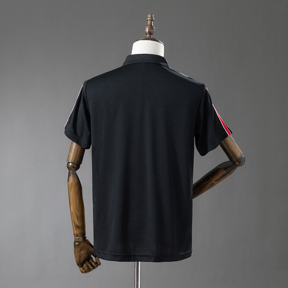 Manchester United 25/26 POLO Black Foto 2