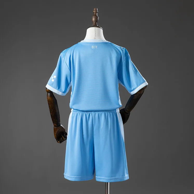 Manchester City 26/27 Home Kids Kit Jersey Foto 2
